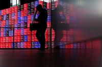 Euro slides on France worries; Fed pause hopes support stocks