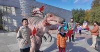 Northeast China’s dinosaur hometown draws holiday visitors with prehistoric charm