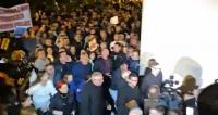 Thousands of protesters trap Polish bishop in church amid anger over dismissal of local priest