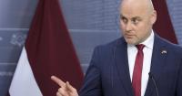 The Latvian Prime Minister announces changes and promises to bring order to the finances after his wide electoral victory.