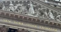 U.S. stocks hold near records after oil prices swing lower