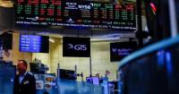 Nasdaq hits record as dollar and Treasury yields climb, oil prices ease