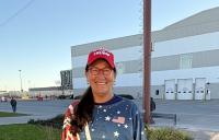 Nita Lechner of G.I. wears 'Nebraska for Trump' baseball hat, Trump socks and patriotic top and pants to Midterm Rally featuring President Donald Trump