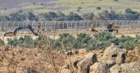 Israel building military line in occupied Syrian territory, Damascus says