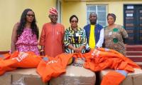 Rite Foods donates 600 protective coveralls, working tools to Ogun waste management workers