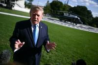 Russia downplays plague reports as Trump offers US help