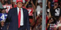 Trump condemned for 'victory lap' over Haitian removals miles from immigrant's funeral