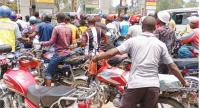 Malawians forced to hitch rides and skip meals as fuel crisis sends bus fares rocketing