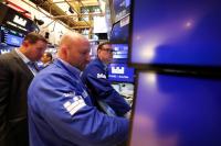 Asian stocks mixed despite Wall Street tech record