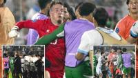 Mass brawl erupts at end of international clash as riot police forced to rush to scene