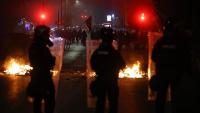 Kosovo police use tear gas on protesters demanding curbs on war crimes court
