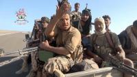 Yemeni government fighters recorded driving vehicles over Houthi opponents