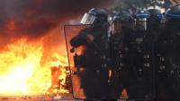 Arson, tear gas and clashes rock France on biggest day of school protests