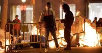 Spain's night of hell as major tourist hotspot becomes no-go zone and arrests made