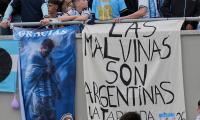 Argentina fans display 'Malvinas' banner laying claim to the Falkland Islands in the stands at Lionel Messi's emotional farewell match
