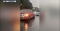 Best friends rescue drivers stranded in flooded Sanford intersection; county officials urge caution