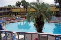 Louisiana Doctor Charged After Nephew, 7, Drowns Underwater for Minutes in Orlando Pool