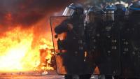 France pauses stun grenades after teen loses hand during clash at student protest