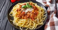 Ground pork pairs with Bolognese sauce for a lighter version of this classic Italian favorite