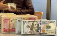 Iraqi MP demands emergency session as official dollar hike paralyzes markets