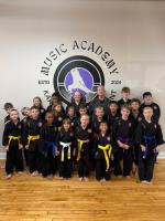 Music Academy of Karate & Empowerment celebrates student achievement, 2 years of service