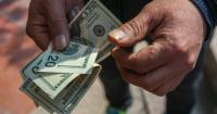 Tehran divided over $2 billion plan to prop up rial