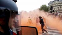France suspends police stun grenades at student protests after teen loses hand