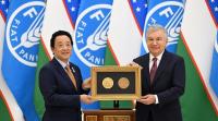 QU Dongyu honours Uzbekistan’s President with Agricola Medal during Tashkent visit