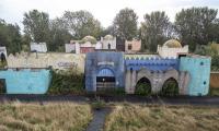 The abandoned tourist attractions around the world left to rot, from a Disney-style theme park in Japan to a hotel that hosted Saddam Hussein