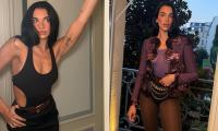 Dua Lipa poses in a black cut-out bodysuit before commanding attention in a sheer purple top as she shares sizzling snaps from her Paris trip