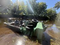 A Maine guide pulled 200 tires from a river last year. Yesterday, he pulled his 700th.