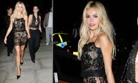 Brooks Nader leaves little to the imagination in a sheer lace minidress at the launch of Tate Britain's The 90s: Art and Fashion exhibition