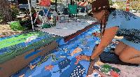 Local Artist Paints Messages of Ocean Pollution Through Murals