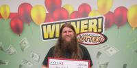 Cozad man claims $50,000 Powerball prize
