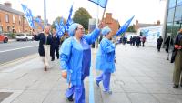 Nurses 'struggling to survive' picket at hospitals across country in dispute over public sector pay