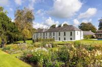 Historic linen house set in 28 acres with equestrian facilities, heated outdoor pool and additional three-bedroom property now on the market in Northern Ireland