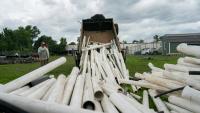 Flooded Factory's PVC Pipes Still Clogging River Two Years After Hurricane Helene