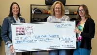 Women Who Care make donation to the Union City Schools Food Club