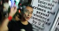 Dozens protest in Tokyo after US Marine accused of killing woman in Okinawa