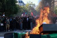 France suspends stun grenades as school protests sweep country