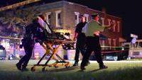 Medics find gunshot victim, injured officer at the site of a shooting in east Baltimore