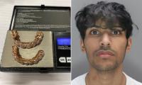Moment phone fraudster who stole £200,000 crypto cash and splashed out on gold grills, plush apartment and luxury Dubai trips is arrested at Heathrow