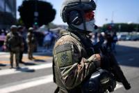 Trump administration sues Denver over its mask ban for ICE agents