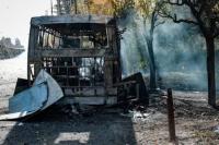 Russian guided bomb kills 30 near buses in Ukraine
