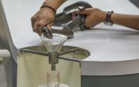 Scientists in Kenya extract venom from live snakes to make East Africa's first tailored antivenom