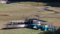 After record heat dries lake on French-Swiss border, locals cut 'HELP' and 'SOS' into weeds