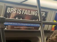 A new campaign on the T criticized BPS. Then the ads were pulled down.