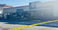 2 injured, driver charged after truck crashes into Burger King in Dinwiddie, Virginia State Police say