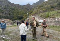 International travelers tour Khudavang Monastery Complex in Kalbajar