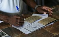 Cuban ration book, symbol of the revolution, gathers dust